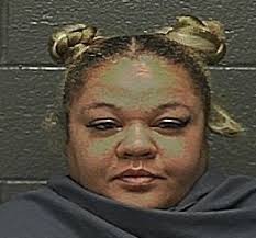 Police: Woman drives backward, throws alcohol