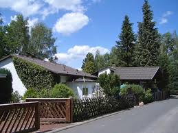Auf der unteren ebene im haus befinden sich windfang/diele, das wohnzimmer mit urigem kaminofen und eine gemütliche essecke. Hauskauf Brombachtal Von Legrum Immobilien Gmbh