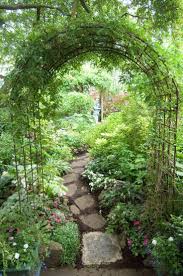 Garden Archway And Path Using Inexpensive Garden Arches Found Everywhere Gardenpathway Garden Pathway In 2020 Garden Archway Beautiful Gardens Garden Arches