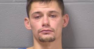 Florida man charged with spitting