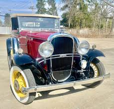 Image result for Garnet Maroon 1931 Oldsmobile