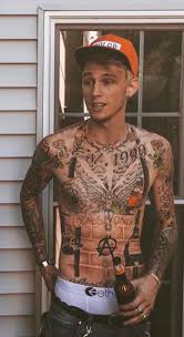 Machine gun kelly and travis barker are showing off their matching ink! Pin On Logotv