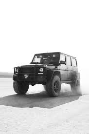 Black Lifted Mercedes G63 Amg With Off Road Tires And Carbon Fiber Fender Flares G Wagon Mercedes G Mercedes G63