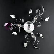 Bold color, clean lines, artsy, sculpted finish with industrial elements. Dora The Ceiling Light Fixture 3 Lights Modern Chrome With Crystals