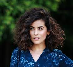 Awesome androgynous cut on curly hair. 35 Best Haircuts For Manageable Thick Hair Of Any Length