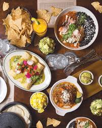 To eat the main meal of the day, usually in the evening: Eric Williams Has Reopened El Carnicero And Momocho For Dine In Service Scene And Heard Scene S News Blog