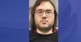 Michigan woman holds fatal stabbing suspect at gunpoint