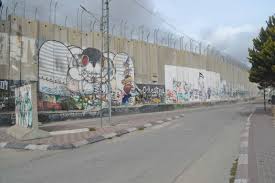Banksy drew on it for the first time in 2005. The Wall In Bethlehem That Segregates And Subjugates Palestinians