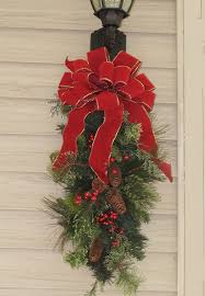 Outdoor Christmas Decorations For A Holiday Spirit Family Holiday Net Guide To Family Holidays On The Internet Outdoor Christmas Decorations Christmas Swags Christmas Wreaths