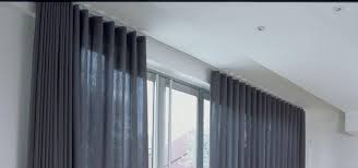 Their ability to manage corners makes them a good match for this type of window design. Motorized Curtains System Hyderabad By Santusanthi2 Medium