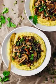 Serve yours with corn tortillas or on a rich bed of cornmeal. Creamy Vegan Polenta With Mushrooms And Beans Emilie Eats