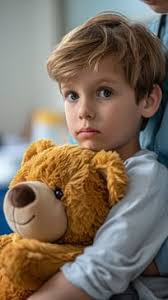 Free Child Holding Teddy Image