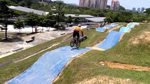 The cycle paths are seldom busy and the air is fresh and clean. Mountain Biking At Putrajaya Challenge Park Putrajaya Malaysia Gokayu Your Travel Guide