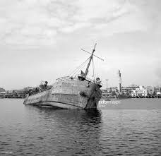 A Ship Sunk By Egyptians To Block The Suez Canal Appears At The Surface Of Water 11 November 1956 In Port Saa D An Anglo French Interventi Suez Egyptian Canal