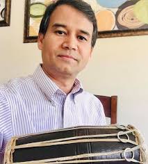 PSC administrator finds solace in playing Madal drum