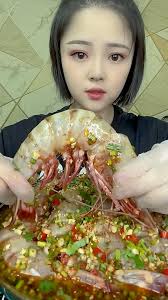 These spicy fresh raw prawns are perfect as an appetizer or a light and  refreshing seafood dish. Enjoy the bold flavors and freshness with each  bite!