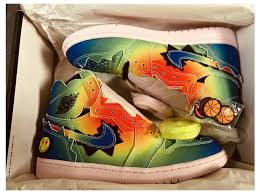The sneaker features a multicolored upper with the reggaeton star's smiley face logo on the heel and tongue. Nike Nike Air Jordan 1 J Balvin Sneakers Leather Multiple Colors Ref 245293 Joli Closet