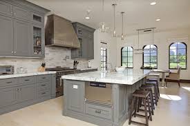 Grey hex tile backsplash contrasts with white cabinets. Grey Kitchen Cabinets And How To Decorate Your Kitchen With Them