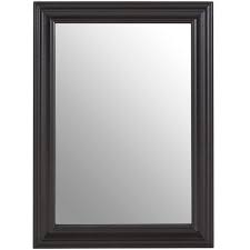 This stunning round mirror scores very highly in the style stakes its unusual design and shape give it a vintage appeal. Regatta Black Wooden Framed Wall Mirror The Haven Home Interiors