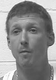 Two hospitalized, car burns after collision