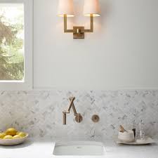 Step 5b in adding a glass tile backsplash to a kitchen is to set the tiles against the thinset adhesive. Strong Backsplash Strong A Href Http Www Annsacks Com Products Tile Tile Backsplash Bathroom Kitchen Backsplash Trends Marble Tile Backsplash Bathroom