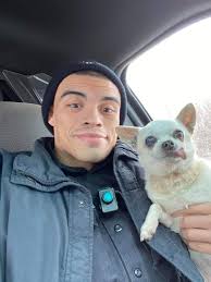 K9 Officer Gamino with his new buddy! He is now at PAWS relaxing.... The  dog. Not Officer Gamino.