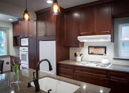 Dark Oak Cabinets With White Countertops And White Appliances Google Search White Kitchen Appliances Dark Oak Cabinets Modern Kitchen Design