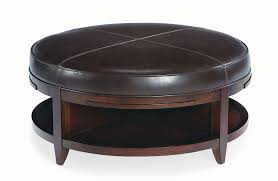 However, ottomans are super versatile, and can work as a coffee table, a footrest, an extra seat and a storage solution—and you can't compete with that. Bernhardt 376 028 Park West Storage Cocktail Table Ottoman 41 Diameter Leather Ottoman Coffee Table Round Ottoman Coffee Table Storage Ottoman Coffee Table