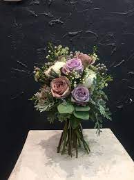 Purple Wedding Flowers Sliverbrunia Amnesia Rose Ocean Song White Anstransia Sliver Leaf White Wa Wedding Bouquets Pink Wedding Bouquets White Wax Flower