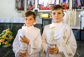 Maybe you would like to learn more about one of these? Two Little Kids Boys Receiving His First Holy Communion Happy Stock Photo Picture And Royalty Free Image Image 125894933