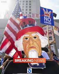 Tens of thousands of demonstrators have flooded the streets of downtown Los  Angeles for Saturday's "No Kings" protest. The rally and march are very  peaceful. It's one of many taking place across