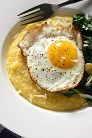 Polenta With Parmesan And Olive Oil Fried Eggs Recipe Recipe Fried Egg Recipes Recipes Polenta