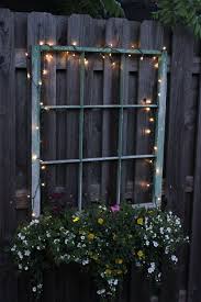 32 Fun And Inspiring Old Window Outdoor Decor Ideas To Make Your Yard Shine Outdoor Window Decor Solar Deck Lights Old Window Frame