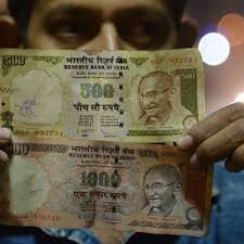 At the top of the watermark area along the upper left side of the note there is the legend. India Withdraws 500 And 1 000 Rupee Notes In Effort To Fight Corruption India The Guardian