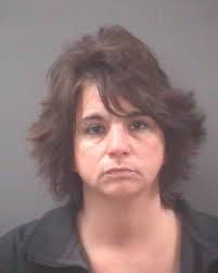 Foster charged with embezzlement