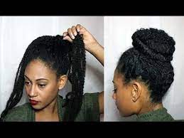 These fulani braids with beads look like a set of natural accessories for her voluminous chevelure. Natural Textured Bun W Marley Braiding Hair Youtube Braids With Extensions Marley Braiding Hair Braided Hairstyles