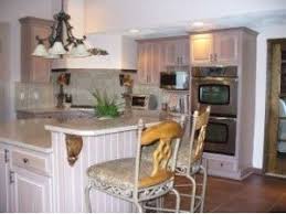 These discount rta cabinets will add a beautiful finish to any kitchen with their. Paint Color Advice For A Kitchen With Cherry Cabinets Thriftyfun