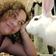 Hi, I'm new here. This is me and my bunny Biscuits.