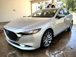 Image result for Sunlight Silver 2007 Mazda3