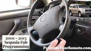 The battery in the key fob of a toyota sequoia is changed by using a coin to separate the two halves. How To Program A Toyota Sequoia Remote Key Fob 2001 2013 Youtube