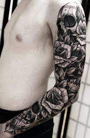 Check out these guns and roses! 50 Skull Rose Tattoos Meanings Tattoo Designs More