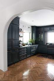 The colors are complementary, so they work well together, says theresa of this kitchen's deep red cabinetry and dark green countertop. Our Dark Moody Kitchen Reveal Room For Tuesday
