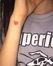 Pin By Izzy On Ideas For Next Tattoos Red Tattoos Red Ink Tattoos Simplistic Tattoos