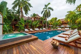 Tropical Pool Side With Wooden Terrace In 2020 Tropical Pool Hotel Pool Boutique Hotel