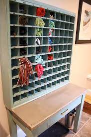 A simple board can be transformed into pretty scarf storage with just a few coats of paint and some coat hooks! 59 Scarf Storage Ideas That Inspire Shelterness