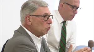 Councilmember Thomas Hucker and Director of Liquor Control Robert Dorfman  speak