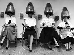Because finding a curly hair salon you can trust is difficult. Women Sitting And Reading Under Hairdryers At Rockefeller Center Pamper Club Premium Photographic P Vintage Hair Salons Vintage Hairstyles Vintage Hair Dryer