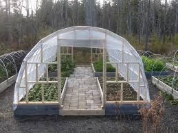 This worked so well, that i made another couple of greenhouses the same way this year and here is how so what does this all cost? Diy Greenhouse The Owner Builder Network Cheap Greenhouse Greenhouse Plans Greenhouse Farming
