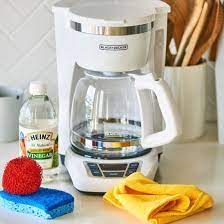 To clean your coffee maker, mix equal parts white vinegar and water and run the solution through a brewing cycle. How To Clean A Coffee Maker Without Vinegar