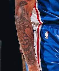 Howard came from a southern christian upbringing. Dwight Howard S 9 Tattoos Their Meanings Body Art Guru